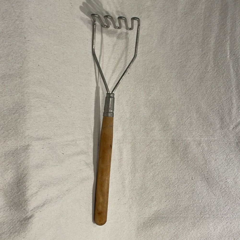 Massive vintage kitchen vegetable/potato masher